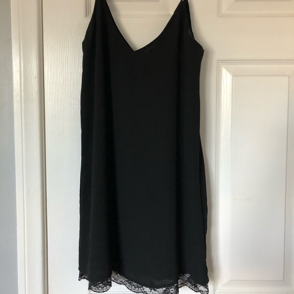 Black slip dress with lace detail